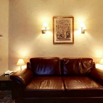 Suite №104, leather sofa