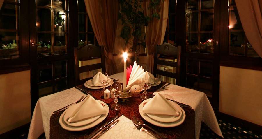 Romantic candlelight dinner in the Trapezna Restaurant, Carpathians