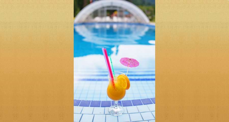 Summer cocktail by the pool at a hotel in the Carpathians, 2018
